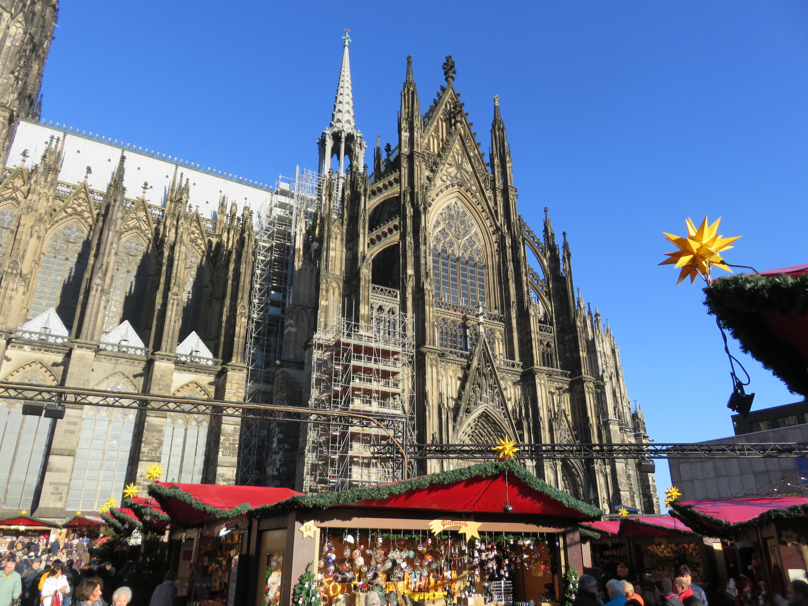 The Cologne Cathedral provides a dramatic backdrop for the Christmas Market in Cologne, Germany